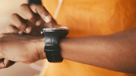 Hands, training and man with wellness, smart watch and tracking workout with progress. Closeup,...
