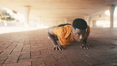 Athlete, black man and pushup outdoor for fitness, exercise and strength training. Male person,...
