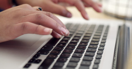 Hands, keyboard and typing on laptop for startup business, research or entrepreneur planning....