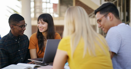 Laptop, group and people in library with studying for college exam, test or assignment together....