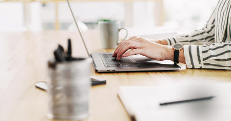 Typing, laptop and hands of business woman in office for blog article, writing project and research....