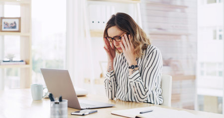 Laptop, fatigue and business woman in office for eye strain, pain or deadline pressure. Accountant,...