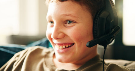 Headphones, home and boy with smile, video game and competition with esports, relax and hobby....