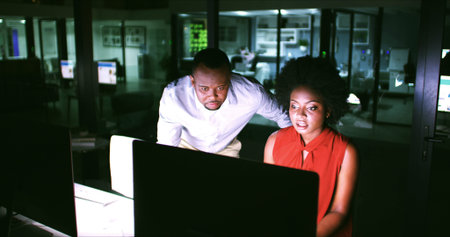 Night, help and business people on computer in office for finance review, budget planning and...