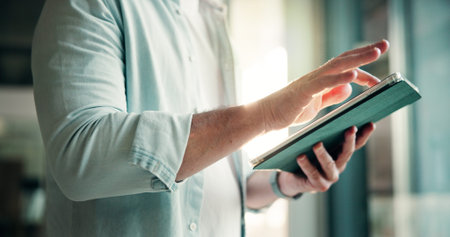 Hands, office and businessman on tablet for finance review, online trading and investment news....