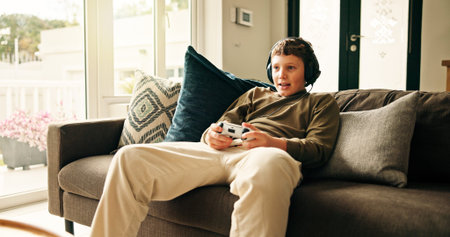 Home, video game and boy with controller, child and entertainment with subscription. Challenge, kid...