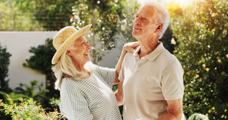 Love, senior couple and happy in home garden with retirement support, bonding together or security....
