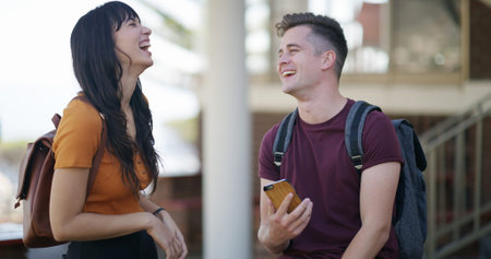 Conversation, joke and friends at university with laughing for comedy, humor or comic together....
