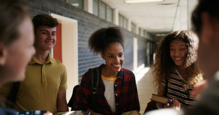 Happy people, students and laughing for funny joke, humor and recess together in school corridor....