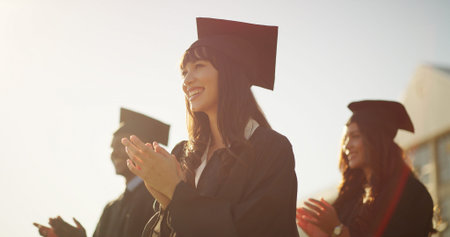 Applause, excited and graduation with students outdoor for celebration, milestone or success....