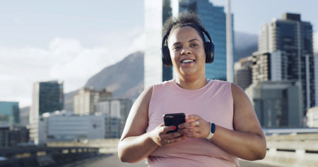 Thinking, fitness and woman with headphones in city to listen to music, audio and workout playlist....