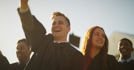 Man, students and cheering for graduation outdoor for education, celebration and class success....