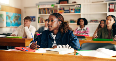 Lesson, girl student and attention in classroom for learning, academic information and education....