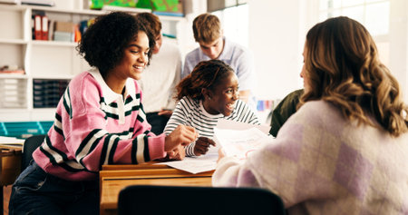 High school, education and girls in classroom, friends and documents with assessment. Group project,...
