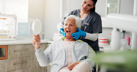 Check, mirror and senior woman at dentist with teeth whitening results, dentures or oral hygiene....