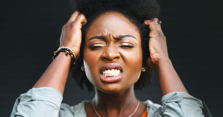 Sad, black woman and frustrated with burnout, risk and regret on studio grey background. Crisis,...
