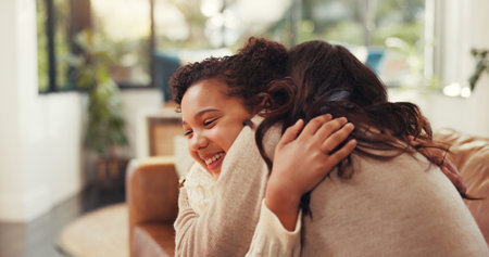 Happy, hug and mom with child on sofa for bonding, relationship and support in living room. Family,...