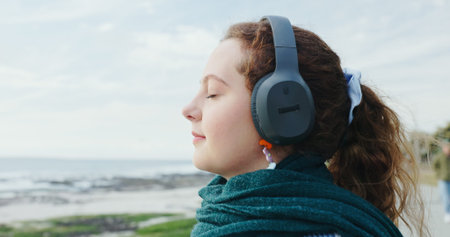 Breathing, tourist and woman with headphones, beach or mindfulness on vacation, streaming and music....
