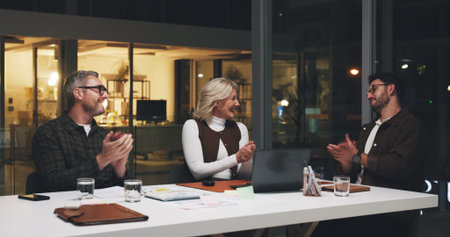 Business people, applause or meeting at night, startup or happy for team achievement at media...