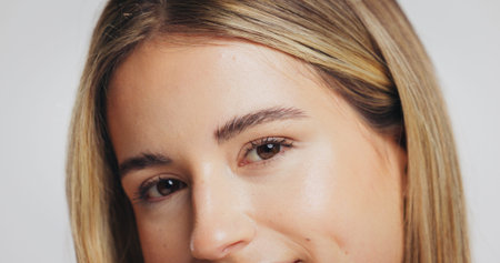 Portrait, woman and beauty for skincare in studio with glow, laminated eyebrows and eyelash...