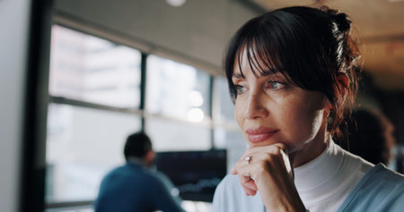 Thinking, corporate and businesswoman in office for planning with stock market for finance report. Ideas, typing and female financial broker with investment proposal for company trading in workplace.の写真素材