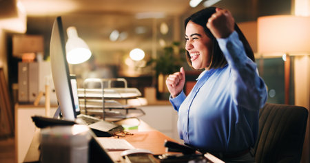 Excited, winner and woman with computer, office or happy for project at night, employee and success....