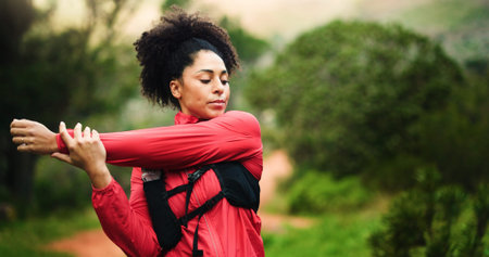 Fitness, woman and stretching arms in nature for health, wellness and flexibility. Sports, training...