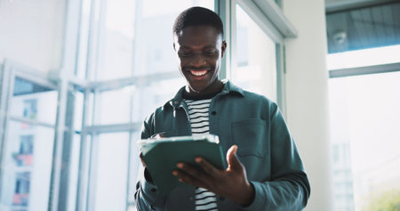 Happy, black man and smile with tablet for schedule, tasks or planning agenda in office. Business...