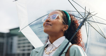 Happy, umbrella and business woman in city for travel, morning commute and trip to work....