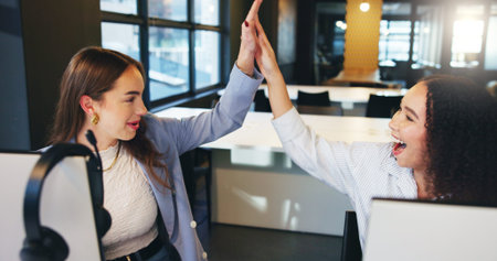 Team, women and high five in call center, excited or celebration for win, success or lead...