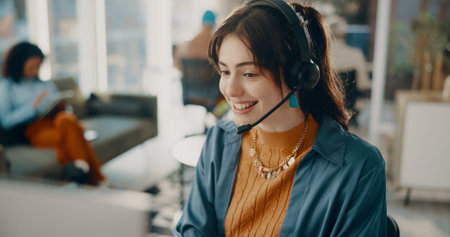 Headset, woman and customer service consultant in office with crm, communication or contact us....