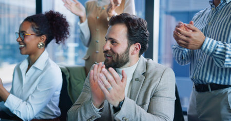Applause, meeting and business people in office with good news, achievement or success. Happy,...