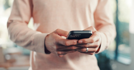 Cellphone, hands and man in home with networking, communication or chatting on mobile app....
