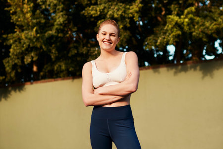Portrait and happy woman with arms crossed for fitness exercise and basketball. Smile, girl athlete...