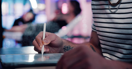 Person, hands or tattoo designer with tablet for digital art, drawing or creative planning in store....