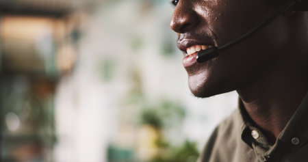 Mouth, telemarketing and man with mic, call center and communication with contact at night or sales. Working late, agent and person with tech for customer service, space and smile for consultationの写真素材