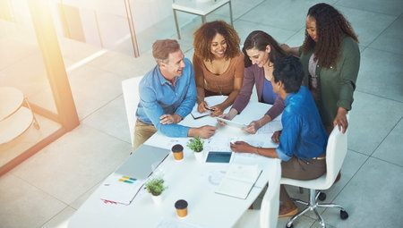 Meeting, business or team in office with tablet, discussion or collaboration for campaign feedback....