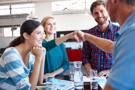 Collaboration, handshake and meeting with business people in office for planning success. Agreement,...