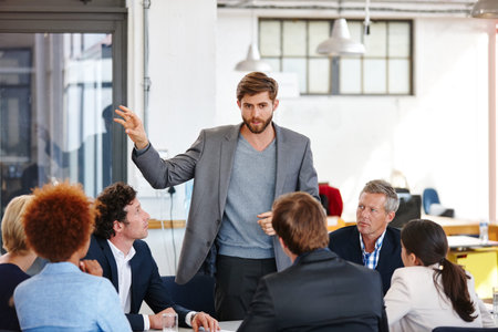 Coaching, development and meeting with business man in office for collaboration or vision. Explain,...