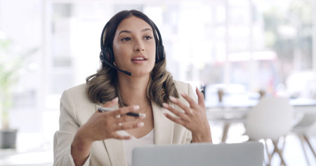 Woman, laptop and headset for consulting, discussion and legal advisory service in virtual meeting...