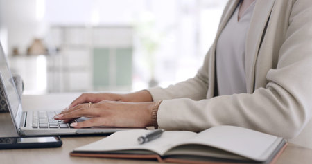 Business woman, hands and typing with laptop in office for journalism, agenda or schedule planning....