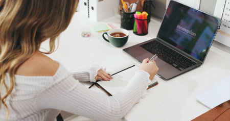 Writing, student and woman in house with laptop screen, e learning and research in innovation....