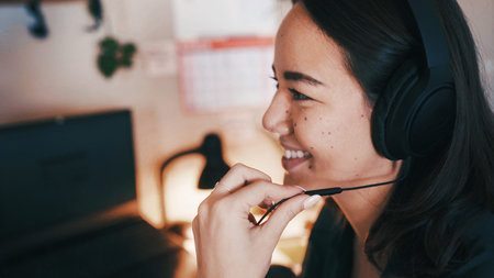 Contact, headset and remote work with business woman in home office for assistance at night....