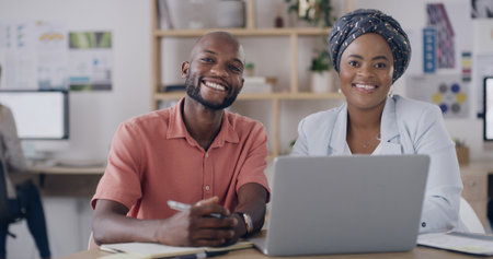 Portrait, man and manager with laptop in office with career pride, about us and graphic designer. Smile, employees and pc for collaboration, marketing team and project management for company brandingの写真素材