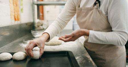 Woman, hands and flour in bakery with dough for baking bread, cooking food and restaurant cuisine....