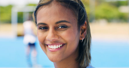 Happy woman, portrait and sport with pride for outdoor fitness, training or practice on court. Face, female person or athletic player with smile, health or wellness for match, game or competitionの写真素材