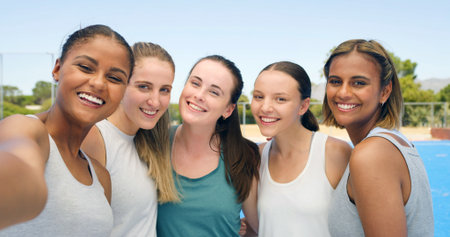 Fitness, selfie and teamwork with women on hockey court together for game, match or solidarity. Exercise, portrait photograph or training with group of friends outdoor at venue for memory picture POVの写真素材