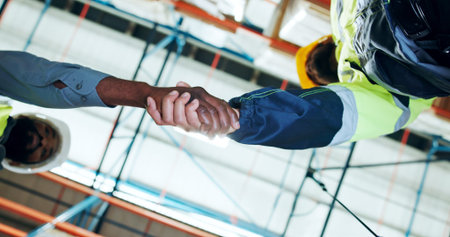 Business people, handshake or logistics with team below for partnership or distribution in storage....