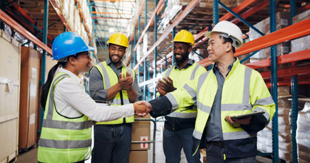 Woman, man and team with handshake at warehouse for logistics, promotion and congratulations for...
