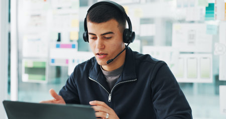 Businessman, agent or discussion with headset on laptop for web help or tech support in office. Male...
